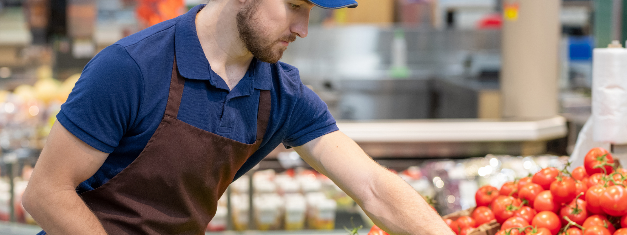 Picture of man working in grocery store